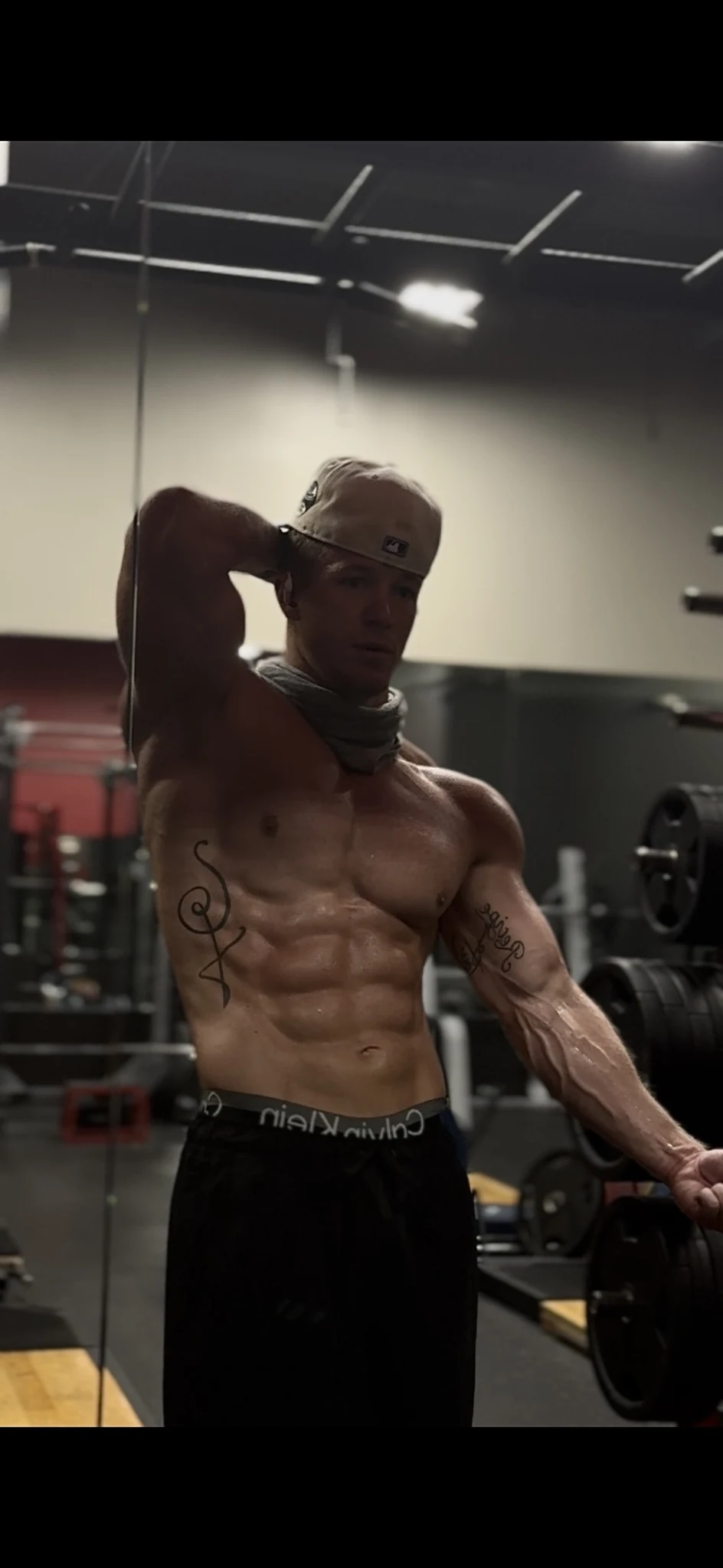 Tanner Culver posing in the gym