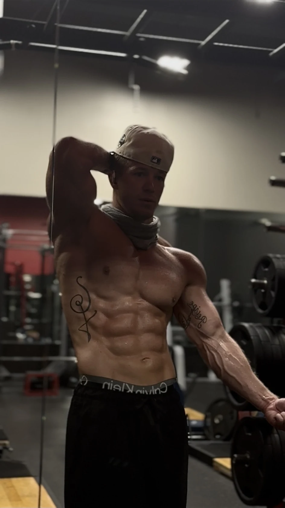Tanner Culver posing in the gym